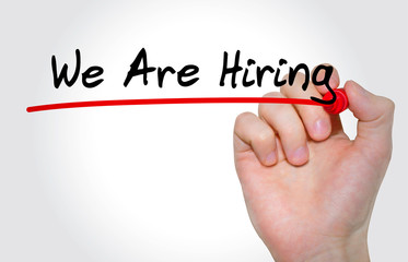 Hand writing inscription We Are Hiring with marker, concept
