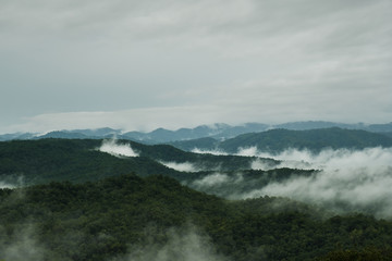Fototapeta na wymiar Mountain with clouds in Thailand.
