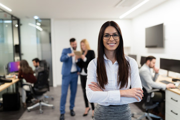 Portrait of young businesswoman posing in office