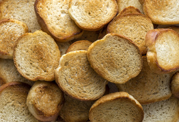 Toasts, fried bread. Food background. Top view.