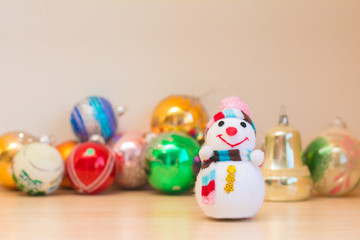 Fototapeta na wymiar Snowman and Christmas tree toys. Christmas composition