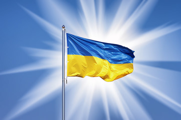 Ukraine flag on blue sky backgroud and big sun