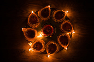 Diya in Thali - Brass Plate or thali full of Terracotta diya or oil lamps ready for decorating or...