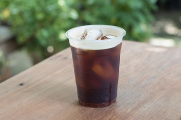 Sparkling Nitro Cold Brew Coffee in take away cup.