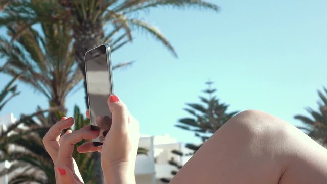 High quality video of woman using mobile phone in 4K