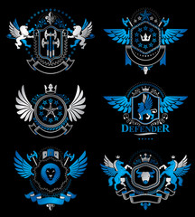 Set of vector vintage emblems created with decorative elements like crowns, stars, bird wings, armory and animals.  Collection of heraldic coat of arms.