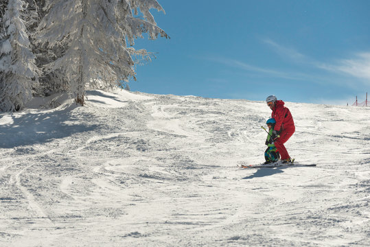 Skiing together down the slope