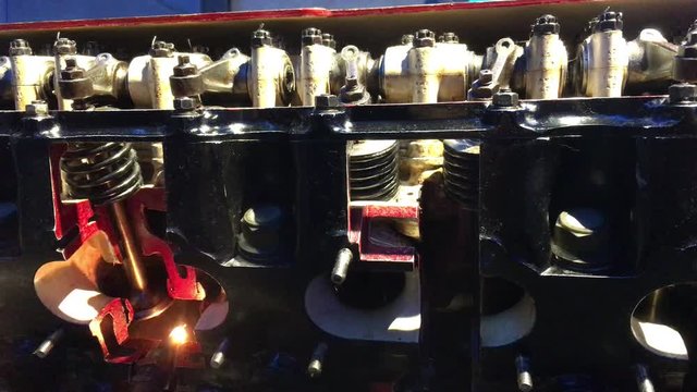 Close up of an internal combustion piston engine.