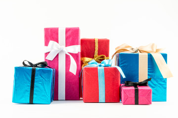 Big pile of colorful wrapped gift boxes isolated on white background. Mountain gifts. Beautiful present box with overwhelming bow. Christmas surprise icon. Happy new year decor, discounts, promotions.