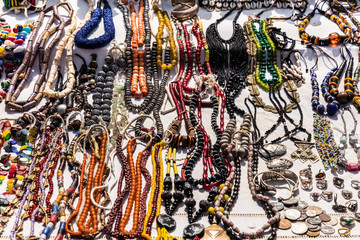 Jewelry necklaces and vintage bracelets at the flea market in Paris. France - 175074711
