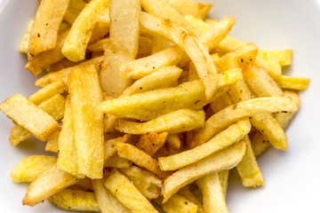 Golden French fries potatoes ready to be eaten