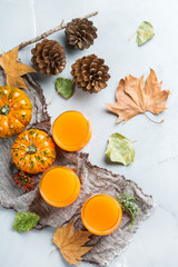 Fototapeta na wymiar Thanksgiving pumpkin autumn fresh juice drink cocktail beverage
