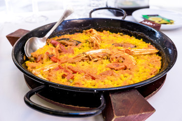 Prawn with rice - closeup of prawn with rice - traditionnal spanish food paella