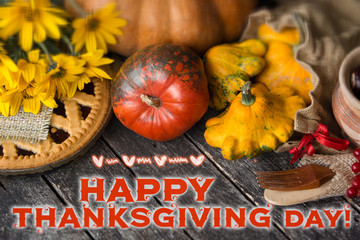 Thanksgiving day concept - traditional holiday food with pumpkins on old wooden. space for text 
