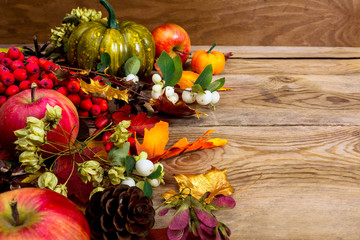 Fall background with apples, white berries and seeds, copy space