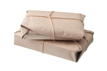 pile parcel wrapped with brown kraft paper