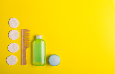 Cosmetics on a yellow background