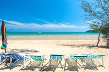 Fototapeta na wymiar Chair beach for relaxation at the tropical beach