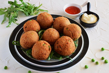 Fish balls with tuna and green peas