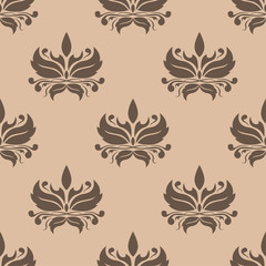 Brown floral design on beige background. Seamless pattern for textile and wallpapers