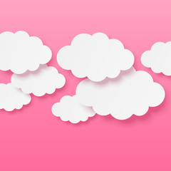 Obraz premium Paper clouds on pink background