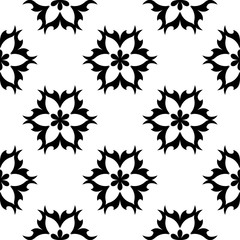 Black flowers on white background. Seamless pattern for textile and wallpapers