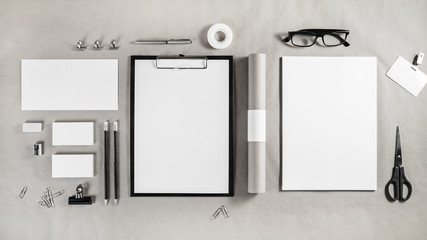 Corporate identity template. Photo of blank stationery set on craft paper background. Mockup for branding identity. Top view.