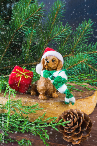 Christmas Symbol Dog On A Stump With Fir Branches Cones