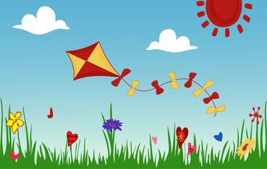 Colored kite flies on background of spring sunny meadow.