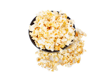 Popcorn in bowl on white background