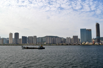 Fototapeta premium The result of expansive development in China. It's Dalian city, not even Top 10 biggest city in China. Pic was taken in August 2017