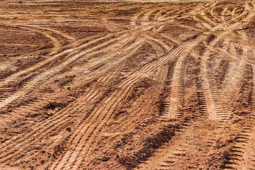 Tired track on the ground.