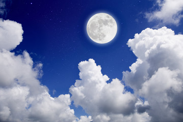 Naklejka na ściany i meble Blue night with full moon over cloud background. Romantic concept.