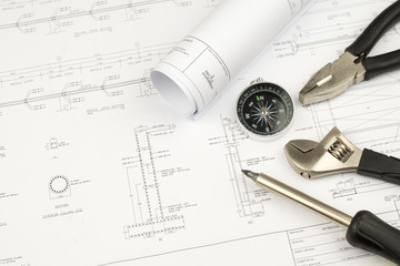 engineer construction business work concept : engineering blueprint diagrams paper drafting and...