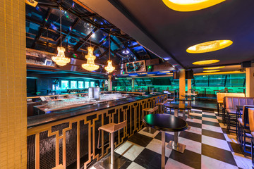 Discotheque interior with counter bar stools and ceiling