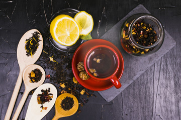 Tea in mugs and wooden spoons