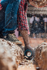 Construction worker,Repairing a broken water pipe on the concrete road.