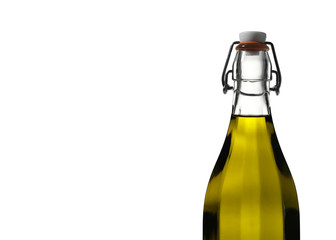 Light glows through olive oil in a clear glass bottle on white