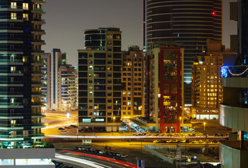 Fototapeta na wymiar Nigh view of the Dubai Marina district Greens