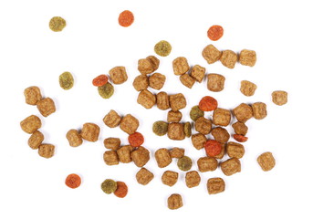 Dry dog food isolated on white background, top view