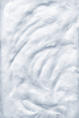 Abstract blue white foam soap bubble background