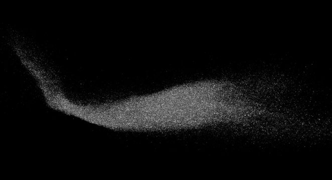 Powder explosion isolated on black background, abstract dust overlay texture, clipping path, top view