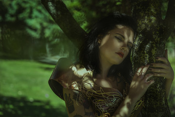 Naklejka premium Fantasy, Queen in silver and gold armor, beautiful brunette woman with long red coat and brown hair