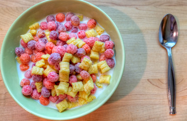 Bowl of breakfast cereal with a spoon