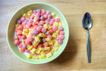 Bowl of breakfast cereal with a spoon
