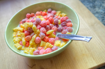 Bowl of breakfast cereal with a spoon
