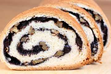 breakfast: three pieces of fresh and tasty homemade bun with poppy seed and walnut, copy space