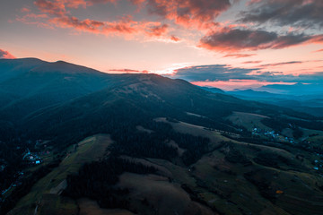 Aerial view of the village in the Carpathian mountains on the Sunset