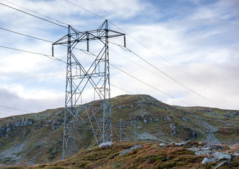 Hydro electric power lines crossing high mountains