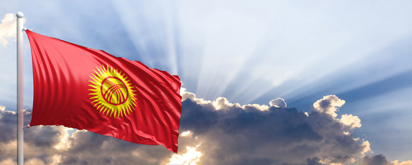 Kyrgyzstan flag on blue sky. 3d illustration
